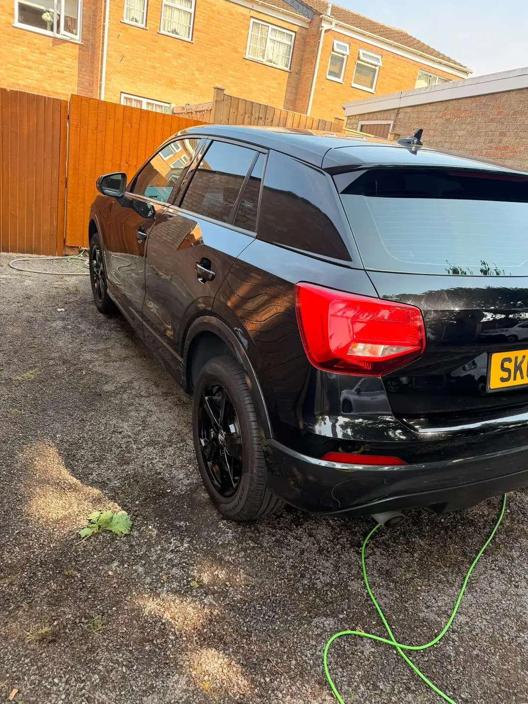 Audi Q2 rear view in evening light after detailing