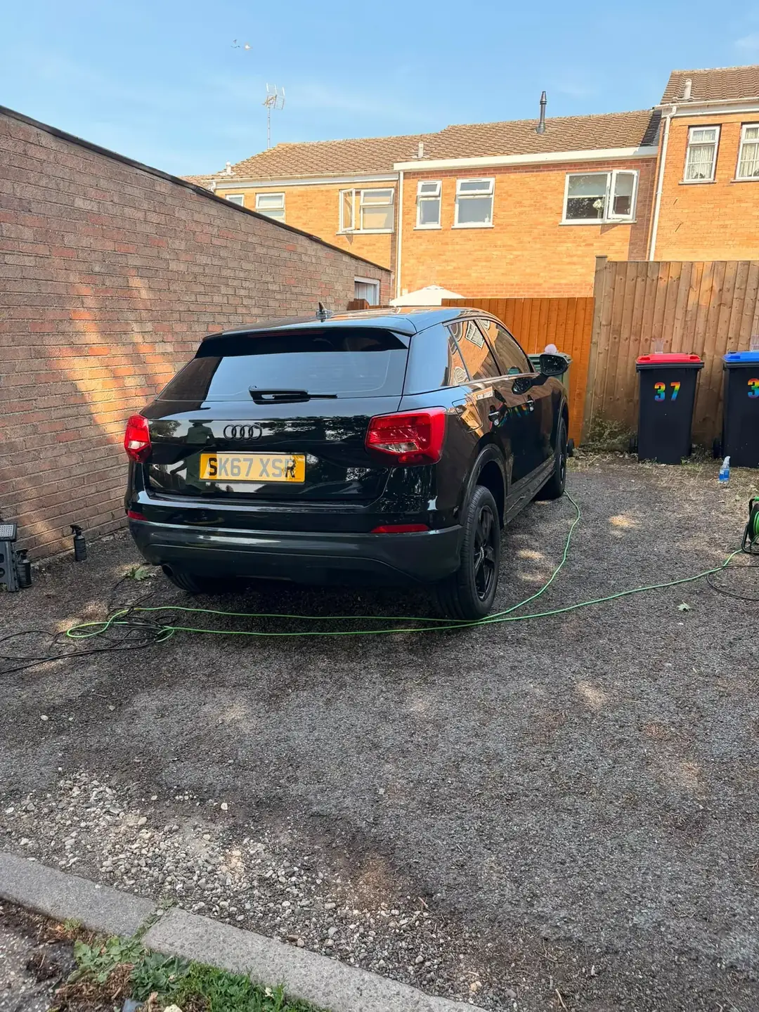 Audi Q2 rear with sun catching the finished paintwork
